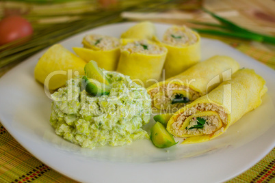 Rolls of egg pancake with turkey and mashed brussels sprouts