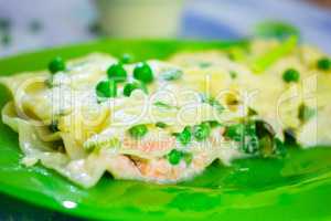 Lasagna with salmon in bechamel sauce