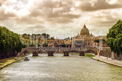Tiber river, Ponte Sant'Angelo and St. Peter's cathedral, Roma, Italy