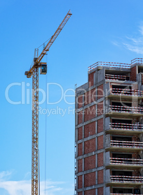 Building Crane and Building Under Construction