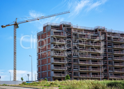 Building Crane and Building Under Construction