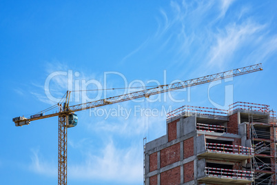 Building Crane and Building Under Construction