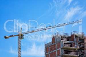 Building Crane and Building Under Construction