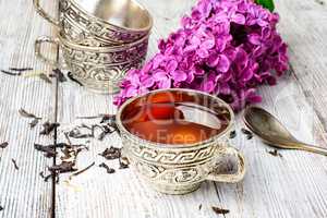 Stylish metal cup of tea