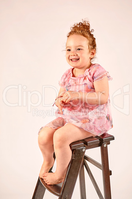 Little Girl Fashion Model in Rose Dress