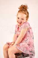 Little Girl Fashion Model in Rose Dress