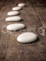 White stones on wood