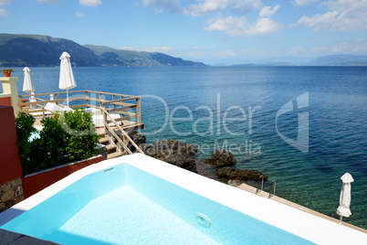 The swimming pool near beach at luxury hotel, Corfu, Greece