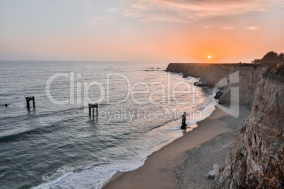 Sunset over Davenport Pier Beach