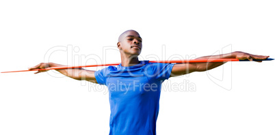 Sportsman with closed eyes preparing to javelin throw