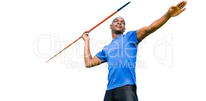 Concentrated sportsman practising javelin throw
