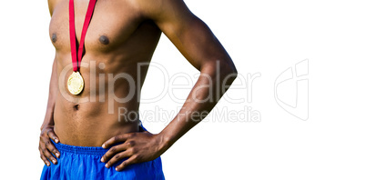 Close up of sportsman chest with a medal