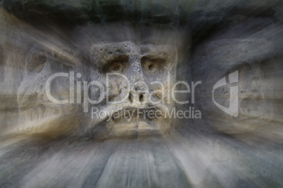 Bizarre Stone Heads - Rock Sculptures - in zoom