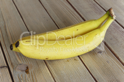 Bananas on wooden table