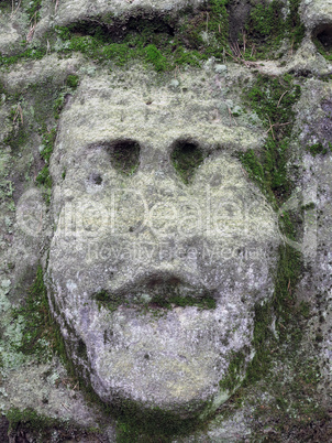 Mossy Bizarre Stone Heads - Rock Sculptures