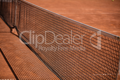 Tennis balls on the ground of clay court