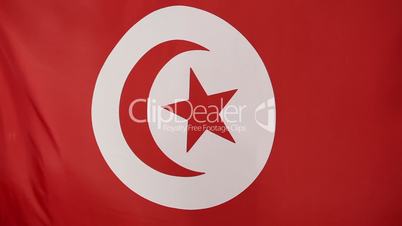 Closeup of Tunisian flag in slow motion
