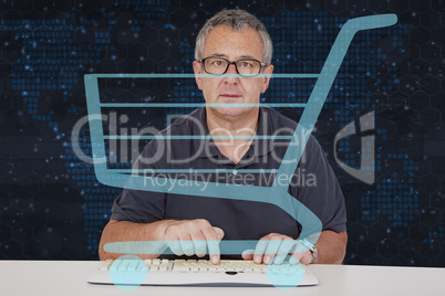 Man sitting at the computer keyboard in front Digital Wall