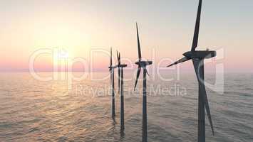 Windkraftanlagen im Meer bei Sonnenuntergang
