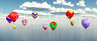 Heißluftballone über dem Meer
