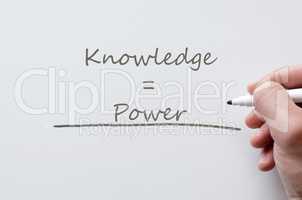Knowledge and power written on whiteboard
