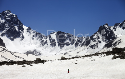 Hiker in snowy mountains