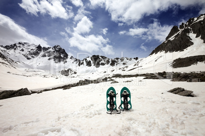 Snowshoes in snowy mountains