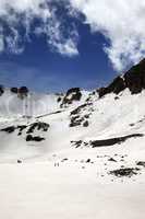 Hikers in snowy mountains