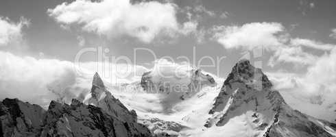 Black and white panorama mountains in cloud
