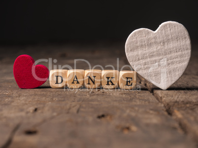 Wooden dices with the German word Thank you