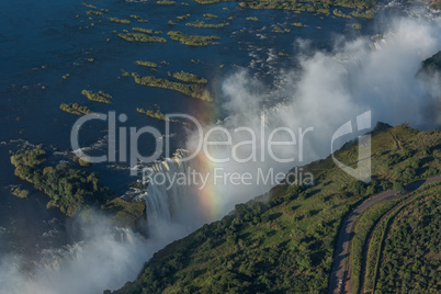 Aerial view of Victoria Falls and rainbow