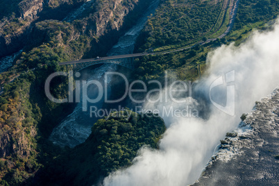 Aerial view of bridge behind Victoria Falls