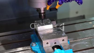 Metalworking CNC milling machine. Cutting metal modern processing technology.