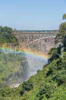 Close-up of rainbow beneath Victoria Falls Bridge