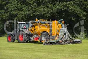 injecting manure in a pasture