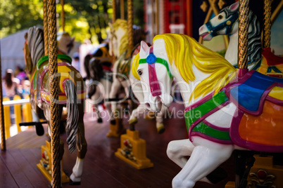 Carousel with Horses on a carnival Merry Go Round