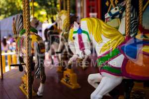Carousel with Horses on a carnival Merry Go Round