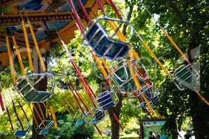 Swing seat carousel at amusement ride