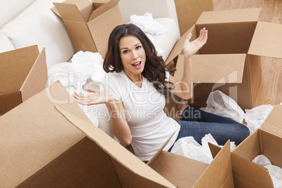 Single Woman Unpacking Boxes Moving House