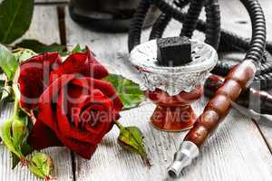 Hookah and red rose