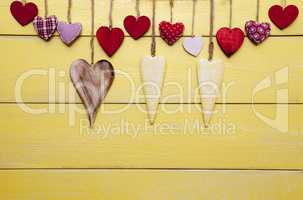 Loving Greeting Card With Red And Yellow Hearts, Copy Space