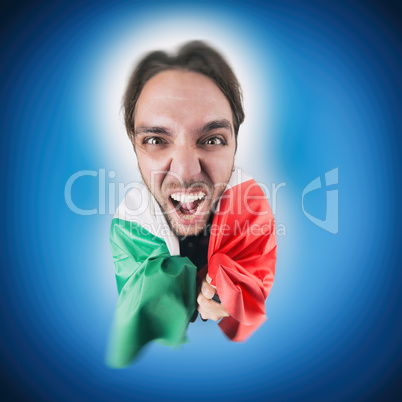 Italian soccer Fan holding the flag of Italy