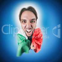 Italian soccer Fan holding the flag of Italy