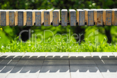 Horizontal park bench bokeh background