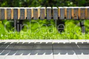 Horizontal park bench bokeh background