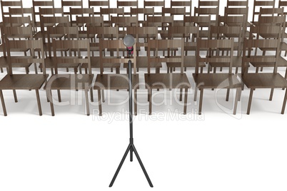 Microphone with empty chairs