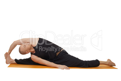 Studio shot of yoga instructor, isolated on white