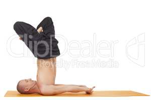 Yoga exercise. Flexible man, isolated on white