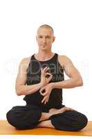 Yoga instructor posing with hands in mudra