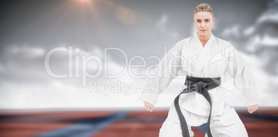 Composite image of female athlete practicing judo